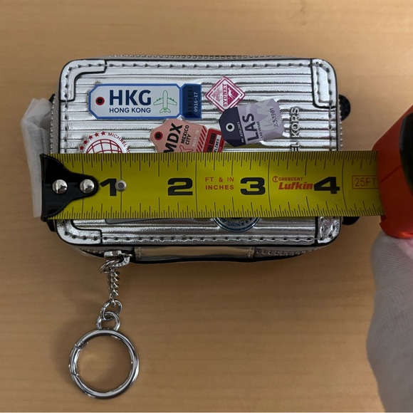 Michael Kors Silver Travel-Themed Trolley Key Fob NWT - Picture 4 of 7